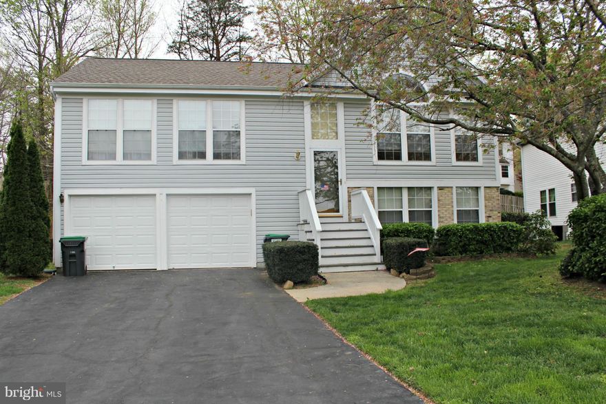 Spacious Split Foyer 4Br 3 Full Bathrooms w/2 car garage!  Screened in porch and deck off of kitchen w/fenced in yard. Basement has a bedroom and a fireplace. Conveniently located a few minutes from I-95, Quantico, schools, restaurants and shopping. Everything you need!