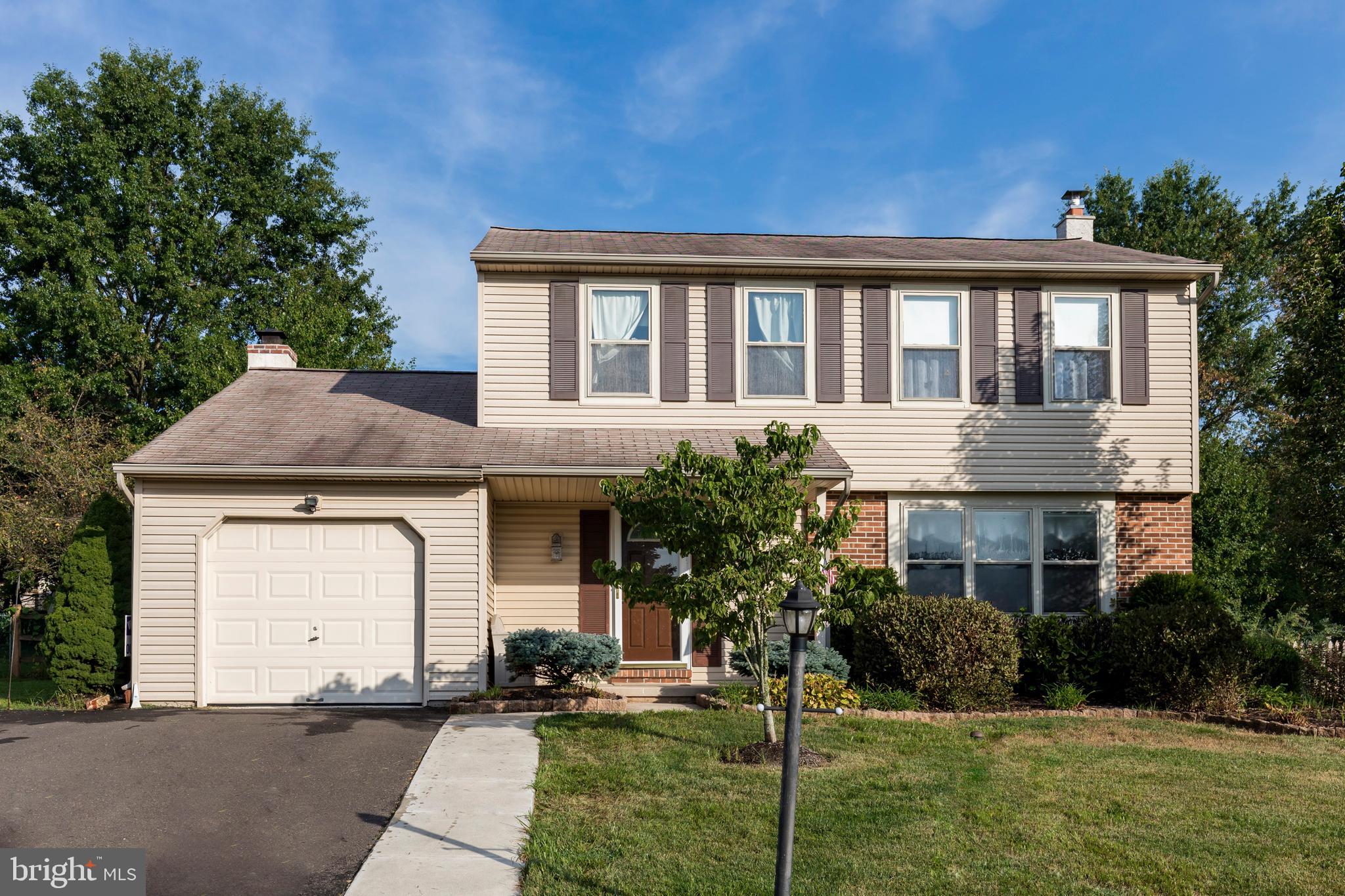 Welcome to the popular community of Cheswyck in Harleysville and desirable Souderton School District.  This 3 Bedroom Classic Colonial will fulfill your needs and exceed your wish list!!  You are greeted with a charming front entry porch and the traditional floor plan is ideal for entertaining and every day life.  The living room and connecting dining room are bright, cheerful and handsomely appointed with gleaming hardwood floors and just right for social gatherings.  The kitchen overlooks the comfy, cozy family room with brick raised hearth fireplace creating the perfect space for coming together and kicking back after a hard day.  Cooking will be transformed from a chore to a joy in the beautifully updated dream kitchen consisting of 42" cabinets containing pull out interior drawers and a double pantry cabinet, tile backsplash, granite countertops, recessed lighting, breakfast bar and stainless appliances including brand new gas range.  Sliding doors from the kitchen and family room lead to the delightful fenced rear yard and composite deck with roll out awning.   A recently updated powder room completes the main living floor.  Upstairs you will find a spacious master bedroom with walk-in closet, dressing area with vanity sink and entrance to the hall bath and two additional good sized bedrooms.  You will find a partially finished area in the basement adding extra space for whatever you need.  Upgraded 200 amp electrical service, new heater and a/c in 2016 and brand new water heater.  Conveniently located close to major routes, restaurants, shopping, parks, township walking trails and within walking distance of Oak Ridge Elementary School.  Don't let this one slip away.