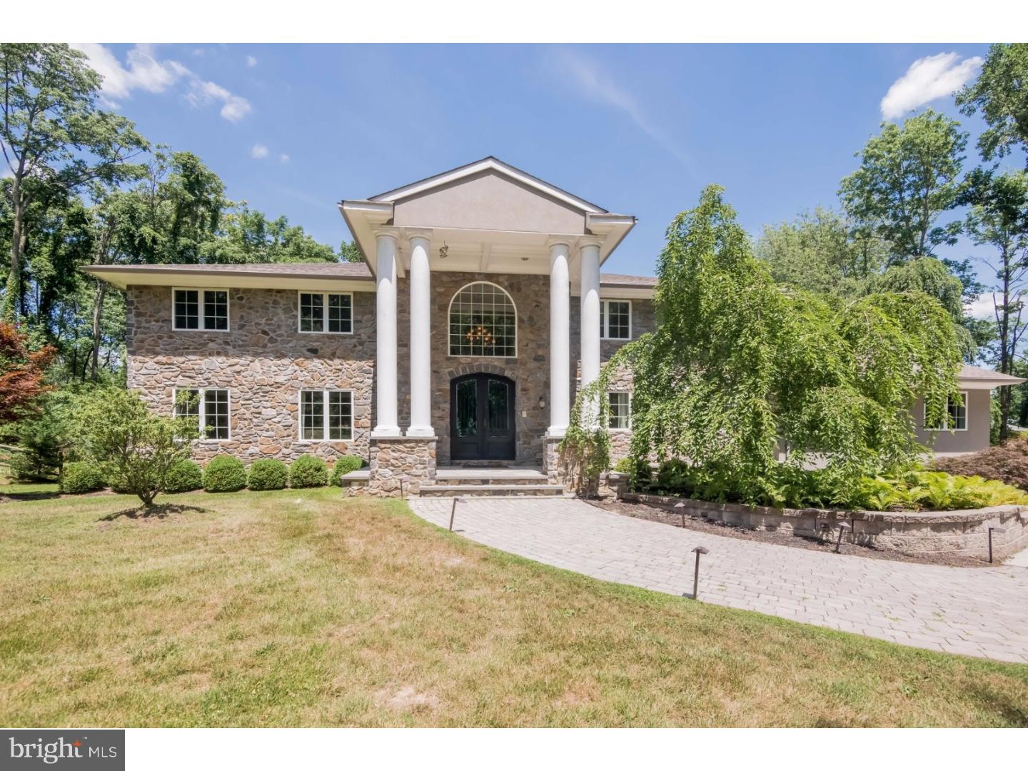 Presiding over 2.25 acres with stunning views of sweeping lawns, gardens, fountain & pool, this picturesque property was originally built in 1980 but TOTALLY remodeled between'07 & '09 to include an additional 3,000sq ft of living space. As you pass through the beautiful columns and covered porch of the entryway you will immediately be encaptured by the warmth of this residence. The versatile floor plan supports grand-scale entertaining alongside casual family living. For example, the largely scaled Great Room boast 10' coffered ceilings, custom limestone fireplace, cherry hardwood floors and triple exposure natural sunlight, including wall to wall french doors with transom windows that lead to a covered porch. The dining room is also nicely sized and has a beautiful fireplace which is flanked by floor to ceiling french doors extending the entertaining space outdoors and offering marvelous natural sunlight and picturesque views across the grounds. Enjoy a more casual style of living in the spacious, eat-in gourmet kitchen and family room combination with marble fireplace and vaulted ceiling. Just beyond the family room you will find a cozy sitting room where you can curl up with a good book or simply put your feet up. The Butler's pantry is fully equipped with wine cooler, refrigerator, sink, 3 large pantry closets and is appropriately positioned between the kitchen, breakfast room and dining room. The loft just outside of the Master overlooks the two story foyer and has a seating area with picturesque views. The expansive Master Suite has entry foyer, is over 1,000 sq ft, has beautiful cherry hardwood floors, tray ceiling, his/her walk in closets, remote controlled room darkening window treatments, and a limestone fireplace flanked by two Juliet Balconies with iron railings overlooking the gardens. Not to be undone the Master bath offers a flare of contemporary style with his & her bowl sinks, wall mounted faucets, a glass & stone body wash shower fit for two, and separate jacuzzi tub. The walk out lower level has a 5th bedroom or au-pair suite with full bath, billiard/game room, large theater/entertainment room, kitchenette area and tons of storage space. This property is a virtual resort with heated in-ground pool, cedar & bamboo pergola covering outdoor seating area, cedar deck, tree house and sweeping views of gardens. The homes systems can be remotely controlled by the NEST system, there is also a back up generator and water filtration syste