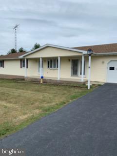 VERY WELL MAINTAINED RANCHER IN PIKESIDE AREA OF MARTINSBURG! MIXTURE OF HARDWOOD FLOORS & CARPET. LARGE KITCHEN WITH ISLAND AND A SUNROOM!! THE FULL BASEMENT IS PERFECT FOR FUTURE EXPANSION! ALL ON APPROX .64 FLAT ACRE!!