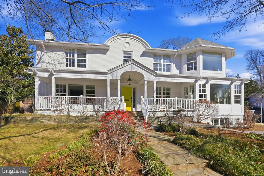 Welcome to 8 Stewart Avenue, located on a rare double lot in the heart of downtown Murray Hill, one of Annapolis’ most coveted neighborhoods. This is an exceptional opportunity to own a completely rebuilt residence offering refined luxury, architectural pedigree, and extraordinary indoor–outdoor living. Designed by Charles Anthony and expertly constructed by Mickey Emory Construction, with interiors by D & L Design, the home was comprehensively renovated in 2014 with uncompromising attention to detail and the highest quality finishes.  As you approach the home, you are immediately struck by the stunning architectural details and the iconic Van Gogh Yellow Hollandlac-painted front door, which welcomes you into a lovely foyer featuring dark wood inlaid floors and double-closet storage. Throughout the residence,  Lauzon beech hardwood flooring in a pearl finish provides timeless elegance.  To the right, the home opens to the casual living side, showcasing open-concept living at its finest. The chef’s kitchen is both beautiful and highly functional, anchored by custom heartwood walnut cabinetry crafted by Woodworking by Design, which extends throughout the kitchen, bar, fireplace mantel, and living room shiplap feature wall. A 12-foot island clad in Bianco Rhino marble with a waterfall edge is complemented by a 48” Sub-Zero Pro stainless steel side-by-side refrigerator, a 48” dual-fuel Wolf range with six burners and griddle, and an Asko dishwasher—creating the perfect space to cook and gather. A large walk-in pantry and direct access to the outdoor kitchen zone complete the kitchen.  The casual dining area is spacious and inviting, surrounded by Marvin double-hung windows that bathe the space in natural light. The formal living and dining side offers the perfect backdrop for elegant entertaining. The living room features a custom honey onyx granite fireplace, heartwood walnut shiplap feature wall, and a refined panel of white café Hollandlac paint. The dining room is equally impressive, highlighted by a dramatic chandelier and custom ceiling treatment. A built-in buffet with a wine refrigerator and storage creates an ideal setting for cocktails and gatherings.  Expansive double sliding doors lead to the exceptional outdoor living space, highlighted by a 25’ x 20’ vaulted pavilion with a tongue-and-groove cedar ceiling. The outdoor kitchen features a Big Sur 48” grill with side burners, an outdoor refrigerator, flagstone countertops, ledgestone veneer, custom tile finishes, and a fully enclosed custom cedar fence. A professionally designed irrigation system services the entire property, offering 23 rotary heads, 12 pop-up heads, nine zones, and dual control valve boxes.  Retreat to the second level, where a stunning five-star primary suite awaits, designed for comfort and elegance. The expansive primary retreat features a spa-inspired marble bathroom with heated floors, a freestanding soaking tub, an oversized custom shower with dual shower heads, and refined finishes throughout. The dramatic wall-to-wall “runway” walk-in closet offers boutique-style storage and display. Three additional generously sized bedrooms and two full bathrooms—one en suite—feature custom tilework and high-end fixtures. A dedicated second-floor laundry room adds convenience, while a large skylight floods the level with natural light.  The lower level is thoughtfully reimagined with a spacious family room, abundant storage closets, and a private guest suite complete with a connecting full bathroom featuring heated floors and a seamless glass shower—ideal for guests or multigenerational living.  Do not miss the opportunity of a lifetime to own this one-of-a-kind Murray Hill masterpiece. Please contact the listing agent for additional information. Welcome home!