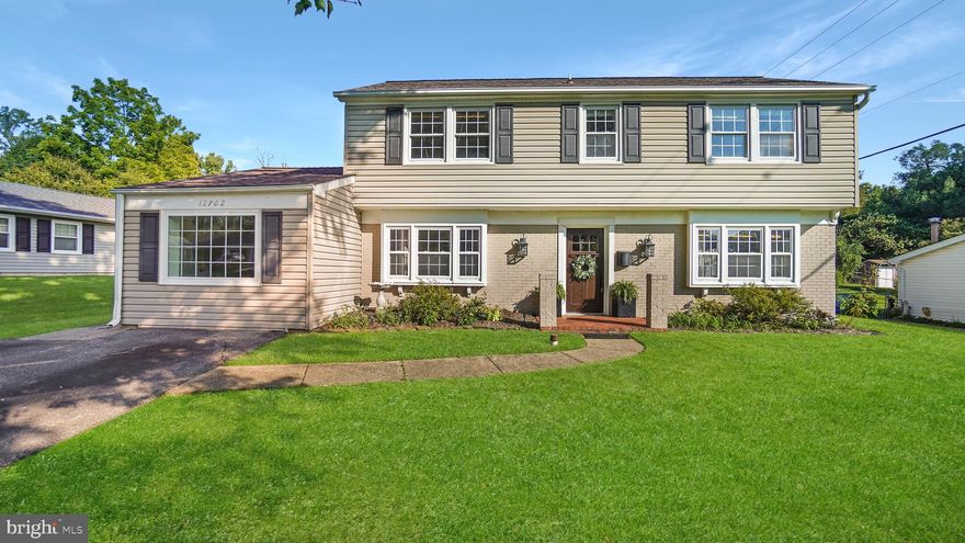 Exceptional opportunity to own in Kenilworth.  Enjoy the extra large floorplan with over 2300 square feet. This is a rarely available colonial with the garage converted to a main level bedroom or office, updated eat in kitchen, and a delightful screened in porch addition which can serve as a relaxing space, or a place for indoor plants. Follow through to the deck overlooking the fenced yard which provides privacy and security, making it an ideal space for outdoor activities,  gardening, and relaxation. It's especially beneficial for families with children or pets. There's even a storage shed for your yard tools. 
The living room with a fireplace adds both functionality and charm. Fireplaces are often a focal point of a room and can create a cozy atmosphere, especially during colder months. Upstairs, the Primary bedroom has been remodeled with a walk-in closet and full bath. Freshly painted, cleaned and ready for you to call this your home!
Conveniently located with easy access to schools, shopping, DC, Annapolis, Ft. Meade/NSA.