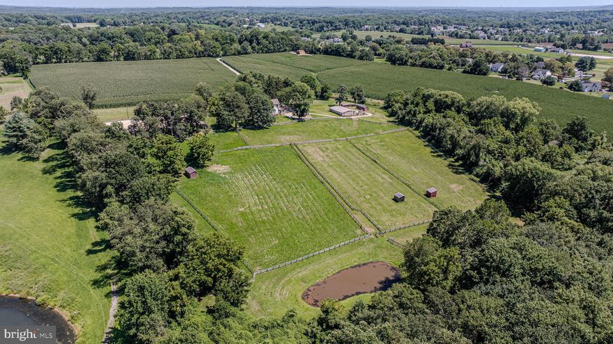 Tucked away down a long private lane on 11.5 serene and secluded acres, this charming farmette offers privacy, breathtaking views, and a lifestyle you’ll never want to leave. The beautifully updated three-story fieldstone farmhouse has been meticulously renovated within the past 10 years, receiving a new roof, heat, plumbing, electric, kitchen, baths, and refinished original hardwood flooring—all blending modern convenience with timeless character.

Equestrians will appreciate the thoughtfully designed barn complex, complete with five matted stalls, tack room, feed room, hay storage, and grooming areas. The historic stone barn ruins have been revitalized to enhance the beauty of the horse stables, and the accompanying shedrow barns add to the functionality of the equine improvements. Approximately 9 acres are cross fenced into 6 connecting pastures with 3 turnout sheds, offering plenty of room for your horses to roam—and space to add an additional pasture if desired.

The property also boasts a 100' x 200' sand arena with lighting, perfect for training and riding day or night. A stocked bass pond, perfect for catch and release sport. All of this is ideally located just a hack away from Fair Hill, making it an unparalleled opportunity for horse lovers seeking both convenience and country living.

DO NOT enter property without permission, shown by APPOINTMENT ONLY.