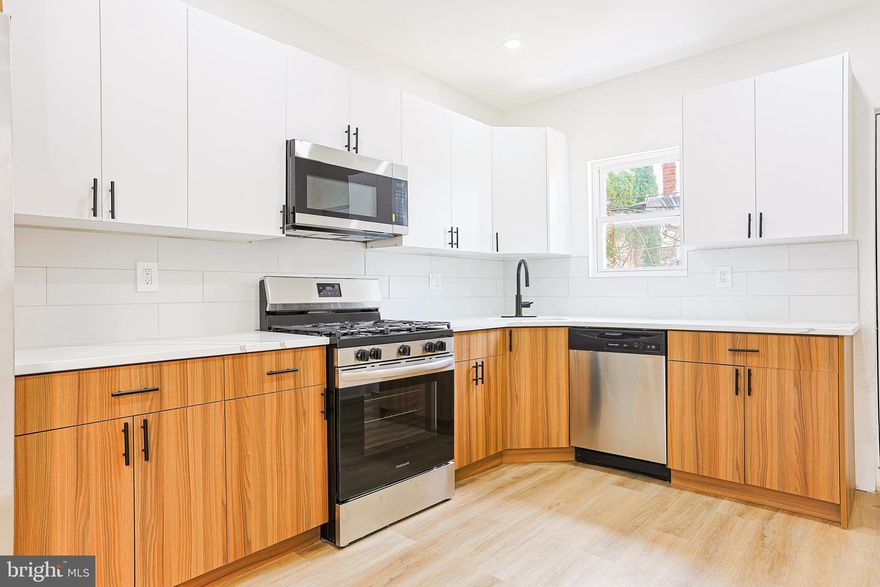 Welcome Home to this unique property. Enter the light-filled great room and enjoy the abundant open floor plan with recessed lighting and a neutral color scheme throughout. The streamlined kitchen features soft-closing cabinets and drawers, quartz countertops, a glass tile backsplash and stainless steel appliances.  A convenient powder room completes this level. Upstairs are three generous bedrooms and a spacious hall bath. The largest bedroom features a private bathroom.  All three bathrooms in the home feature custom tile work and vanities. The fully finished basement includes laundry hook-ups and kitchenette,  This property offers exceptional amenities and is well situated.  
Motivated seller!