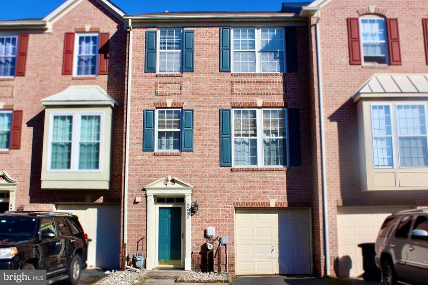 Nestled in the charming community of Perry Hall Farms, this delightful interior row townhouse offers a perfect blend of comfort and style. This home boasts a classic Colonial and Traditional architectural design, featuring a warm brick exterior that invites you in. Step inside to discover a spacious layout that spans 2,034 square feet, thoughtfully designed to cater to modern living. The main level welcomes you with beautiful hardwood floors that flow seamlessly through the dining area and into the family room, creating an inviting space for gatherings and relaxation. The family room, conveniently located off the kitchen, is perfect for entertaining or enjoying quiet evenings at home. The heart of the home is the well-appointed kitchen, complete with an island that provides additional prep space and a cozy spot for casual meals. Equipped with essential appliances, including an oven, microwave, and dishwasher, this kitchen is ready for your culinary adventures. A pantry offers ample storage for all your cooking essentials. Upstairs, you'll find generously sized bedrooms, each designed with comfort in mind. The primary suite features a walk-in closet, providing plenty of space for your wardrobe. The home includes two full bathrooms upstairs and a convenient half bath on the entry level, ensuring that everyone has their own space. Enjoy the tranquility of nature as this property backs to lush trees, offering a serene view from your deck. Imagine sipping your morning coffee or hosting evening barbecues in this peaceful outdoor setting. The deck is an ideal spot for relaxation or entertaining guests, surrounded by the beauty of the woods. Additional features of this home include a security system for peace of mind, a lower-level laundry area for convenience, and an attached garage with inside access, making parking a breeze. The community amenities include well-maintained common grounds, perfect for leisurely strolls or enjoying the outdoors. With its inviting atmosphere and thoughtful design, this townhouse is not just a house; it's a place to call home. Experience the perfect blend of comfort, convenience, and natural beauty in Perry Hall Farms. Don't miss the opportunity to make this charming property your own!