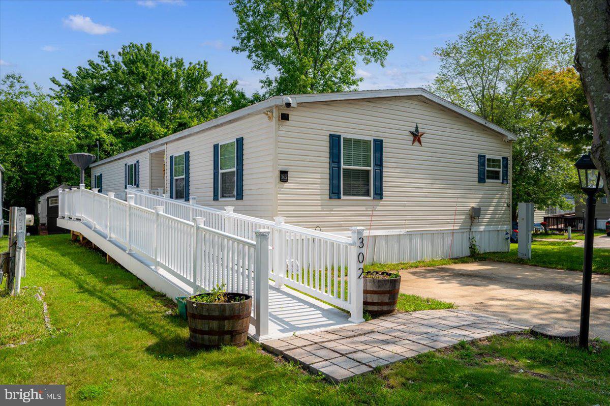 Charming 3-Bedroom Home on a Corner Lot with Modern Comfort & Community Amenities
Welcome to your new home! This spacious 3-bedroom, 2-bathroom property offers over 1,600 square feet of thoughtfully designed living space on a desirable corner lot. With 2x6 construction, vinyl siding, and an asphalt shingle roof, this home is built for energy efficiency and long-term savings.
Step inside to find a large kitchen featuring a central island—perfect for cooking, entertaining, or gathering with family. The open layout flows seamlessly into the living and dining areas, creating a warm and inviting atmosphere.
Retreat to the primary suite, complete with a luxurious soaking tub, separate shower, and ample space for relaxation. Two additional bedrooms and a second full bathroom provide flexibility for guests, a home office, or growing families.
Enjoy outdoor living with two porches/patios, including a custom ramp leading to the main porch for added accessibility. A 2-car off-street driveway offers convenient parking, and an outdoor shed gives you extra storage space for tools and toys.
Located in a vibrant community, you’ll have access to amenities such as a pool, basketball courts, tennis courts, playground, and a dog park—something for everyone in the family to enjoy!
Don’t miss your chance to own this well-built, feature-rich home in a neighborhood that truly has it all