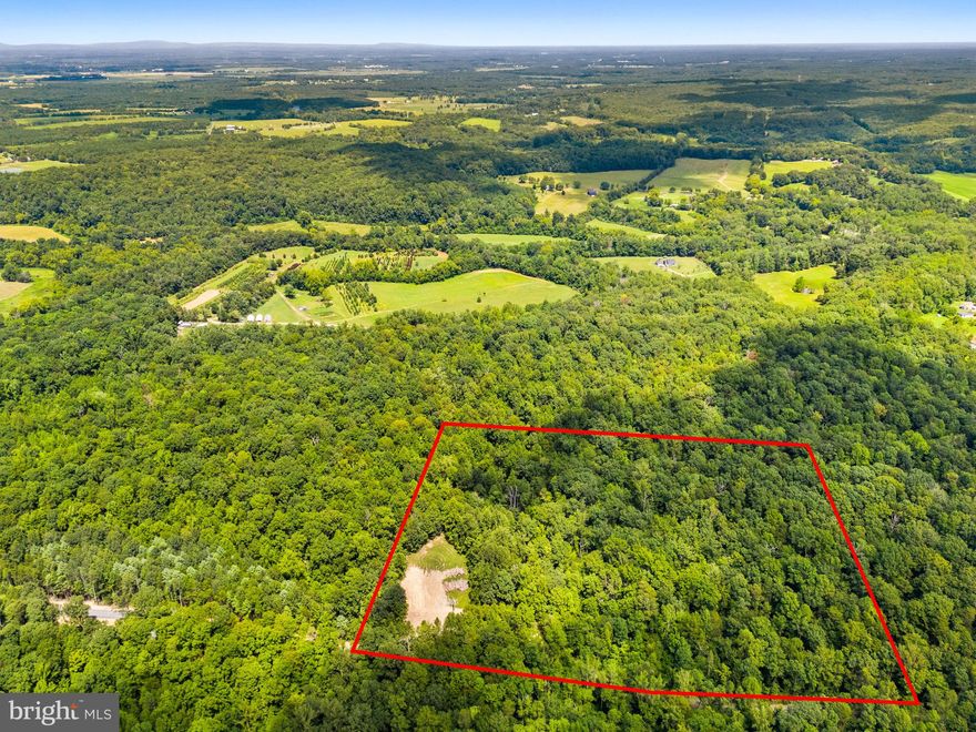 Beautifully situated in Elkwood, this 30 +/- acre parcel offers a rare opportunity for future development or provides for a private estate type setting. The land features a mix of mostly wooded areas and some open clearings with rolling topography—ideal for building sites, recreation, or agricultural use. Three perc sites found. The property is well-suited for a future subdivision into three 10-acre lots, offering flexibility for future homes or investment potential.

Located within a large-lot rural community, the property benefits from light covenants and restrictions that help preserve the peaceful character of the neighborhood while allowing plenty of freedom for land use. A road maintenance agreement is in place. Enjoy the privacy and tranquility of the countryside with proximity to Culpeper, Warrenton and commuter routes.
All corners of existing lots are marked by big green metal posts with an orange paint on the top
Property in land use. Purchaser responsible for maintain land use or removing from land use.