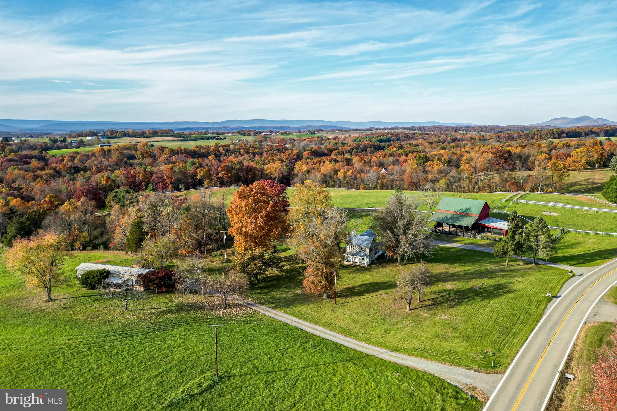 27 acres with gorgeous views! Excellent location to build your dream home (while living in the well-maintained trailer with 2 beds, 2 full baths, a porch, and separate entrance). Farm has top quality orchard grass hay field that produces round bales and square bales. Ditch Run Creek runs throughout the farm and there is also a small pond. With the Chesapeake Canal and the Ohio Canal running through Hancock, enjoy hiking on the C&O trail and Maryland Rail Trail along with the Potomac River and linear riverside park. Enjoy riding, hiking, and 4-wheeling on this property as well as the C&O Canal which is minutes away. Only 18 miles to Frederick, Maryland, 42 miles to Martinsburg, West Virginia, and and 3 miles off Route 70.