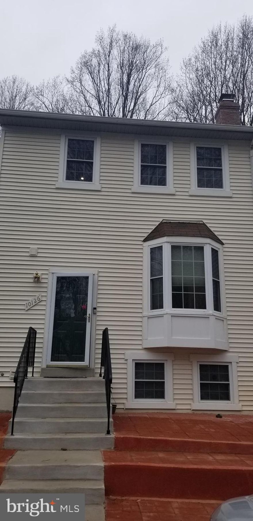 Remodeled beautiful 4 BR, 3.5 BA, 3 Level end-unit Town House with over 2000 sq. ft. of living space in the sought-after community.  Living room, formal dining room and kitchen on the main level.  Three bedrooms upstairs and fourth in the walkout lower level.  In addition to one bedroom, basement has a full bathroom, and a large living area which can be a living quarter on its own.  Many new upgrades: New Flooring, New Appliances, New Faucets, Freshly Painted, Quartz Counter, Finished Walkout Lower Level with Fenced Patio & much more.  Two assigned parking spaces in front of the house.  Easy access to Fairfax County Parkway, I-495 and I-95.  Close to VRE, Walmart, Giant, Restaurants and More.