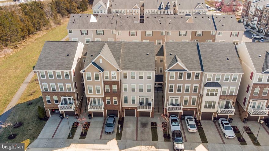 New Price Improvement...sweetheart deal, get it before it's gone! Luxury Meets Modern Convenience in This Stunning Four-Story Townhome. Discover the perfect blend of city convenience and suburban comfort in this beautifully designed four-story townhome. Featuring 3 generously sized bedrooms, 4 bathrooms, and a versatile recreation room with a cozy fireplace and direct access to a 1-car garage, this home offers everything you need for modern, low-maintenance living. The main floor boasts a bright and open Great Room that seamlessly flows into the thoughtfully designed kitchen equipped with 42” Aristokraft white cabinetry, elegant Uba Tuba granite countertops, and a sleek GE® appliance package, featuring a 22 cu. ft. refrigerator, microwave, gas range, and dishwasher—combining style with functionality. Step outside and enjoy the private deck, offering an ideal space for morning coffee or evening relaxation. On the third floor, you’ll find two secondary bedrooms, each with spacious closets, providing ample storage. Finally, escape to the “loft-style” owner’s suite, complete with tray ceiling, large walk-in closet, and spa-like bathroom with an oversized soaking tub, separate glass-enclosed shower, water closet, and dual vanities. Nestled in a prime location near Route 50 and Route 28, this home provides easy access to popular shopping, dining, and entertainment destinations. Frequent travelers will appreciate the short drive to Washington Dulles International Airport. Beyond the home itself, enjoy resort-style amenities in a vibrant community featuring a swimming pool, clubhouse, and scenic walking trails.
Updates include Air duct cleaning (2024), fresh paint throughout (2025), brand new carpet including 5-year coverage (2025)