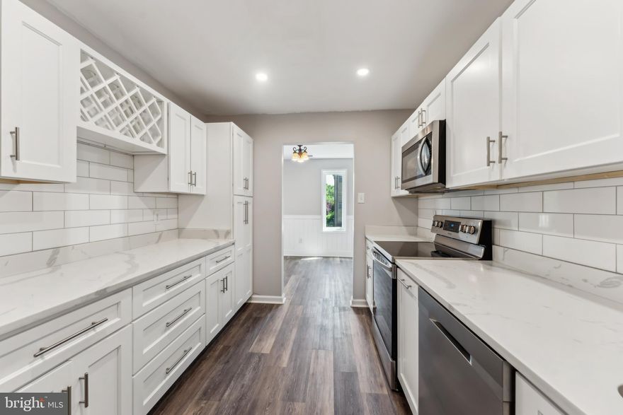 Welcome to your fully renovated and immaculate 2-bedroom, 2-bathroom condo in the highly sought-after Jefferson Mews, ideally located in the heart of Herndon. From the moment you step inside, you're greeted by a refreshing sense of modern luxury, with brand-new gleaming floors, fresh paint, and a beautifully designed open floor plan that flows effortlessly into a bright, airy living area and private balcony—perfect for enjoying your morning coffee or evening drink. The dream kitchen features stylish soft-close cabinetry, top-of-the-line granite countertops, and new stainless steel appliances, while both bathrooms have been tastefully updated with contemporary finishes.  For your comfort and convenience, in unit NEW washer/dryer, reserved parking right out front of the unit, and ample visitor spaces with two overnight guest tags. Enjoy a low-maintenance lifestyle with condo fees covering water, sewer, landscaping, snow removal, and building maintenance, as well as access to a refreshing community pool. Perfectly positioned for commuters and travelers, this home is just one mile from the Silver Line Metro, four miles from Dulles Airport, and minutes from Route 28, the Dulles Toll Road, Fairfax County Parkway, and the vibrant Reston Town Center. Surrounded by local shops, top-rated restaurants, entertainment, and just steps from the W&OD Trail, this condo offers the ideal blend of urban convenience and suburban tranquility—an exceptional opportunity for both homeowners and investors. MAJOR IMPROVEMENTS INCLUDE A NEW WATER HEATER (2018), AND FEATURING NEW WINDOWS, KITCHEN REMODEL, APPLIANCES, FLOORING, AND A NEW MAIN ELECTRICAL BOX ALL COMPLETED IN 2019! Schedule your private showing now!