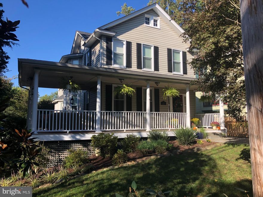 In the heart of Ruxton, this charming Victorian home is centrally located in walking distance to many conveniences such as a gourmet supermarket,  pharmacy, bank, florist and additional village shops. With incredible natural light and many recent updates,  this house has current colors and beautiful design elements. The living space is generous offering an expansive front porch and lovely deck overlooking a fully fenced landscaped yard.  Please see the floorplans in the photos and virtual tour as the living space is open yet has interesting nooks of space for privacy and work at home.  Newly updated paint throughout and beautiful window treatments, this home is very move in ready and feels complete with a designated mudroom, play spaces and plenty of storage.  There is a bright and inviting open first floor with expanded kitchen, family room and breakfast area.  Enjoy holidays in the dining room with fireplace and open living room which extends to the covered front porch.  This overflow space is ideal for morning brunch or dinner parties, kids' playdates or a relaxing morning coffee.    An above grade finished lower level family room and storage add much usable space to this home as well.  The unfinished side of the basement has a laundry space and tons of storage.  Four total bedrooms with an oversized  master complete this charming porch front Victorian. New boiler just added this week!   Seller wants you to love the house as much as they have.  Open House Sunday Oct 4th 12:00-2:00pm.  Baltimore county schools are per the BCPS website.