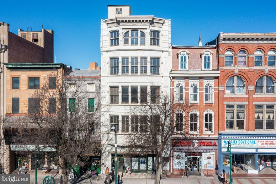 525 Penn Street in Reading City is located on the heaviest traveled block within the city.  This building is situated one block off of the Berks County Court house and Santander Arena.  Most outside public events throughout the year are held on the 500 block.  525 Penn St. building has a total of 6 units, 4 units are leased, generating incoming with a cap rate over 8%.  The building itself is located in the Commercial-Core, historic district of Reading. The roof has been replaced in the past two years, and each unit has its own central air/heat system, for easy utility billing.  Downtown Penn St. has recently added Alvernia University to the 400 block, and a new state of the art hospital is scheduled to be coming to the American House on the corner of the 300 block. In the past few weeks, several sections of the 400 block have been purchased and the improvement and revitalization of Penn St has accelerated.   The benefits of 525 Penn St. is that the property is turnkey and incoming generating, leaving no delay for a build out or renovation process.  This property is ahead of the rest and is located among the best.  All documents available to show you the analytics of success this building has to offer.