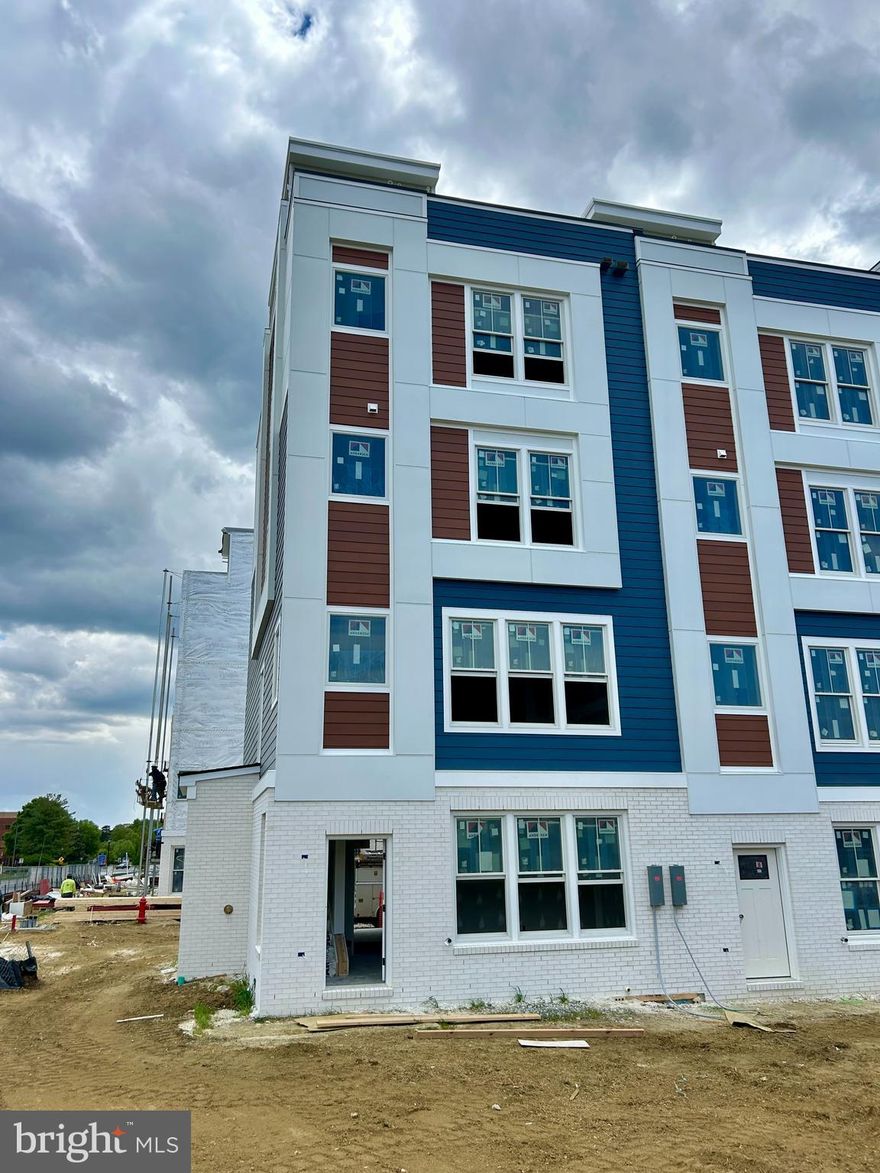 Hard Hat Tours are now available by appointment! Early buyers have the opportunity to customize their home's finish colors and materials. Don't wait! Construction is moving along and the builder will make selections for any unreserved homes.
This listing is for an end unit home on Lot 9. Sturbridge Homes is offering a generous pre-construction incentive package for early buyers. Submit your deposit now to lock in current pricing and have the ability to customize your home!  Sales Center appointments are available now. 
Welcome to Towne Row - A community of 18 Luxury Townhomes in the Annapolis Town Center Corridor.
A Towne Row home is superior in every way. The craftsmanship and expansive spaces are apparent immediately. Notice the contemporary exterior, rooftop terrace for entertaining and stargazing, and two-car garage. Savor the spacious kitchen and luxurious owner's suite, privately situated on its own level, and the high-end materials and fixtures throughout. Live graciously and vertically on four generous levels, whisked up and down by your private elevator. This is Towne Row, your haven, your showplace, your new home. It's like none other in Annapolis. Features include: 3,100 Square Feet of Living Space,  3 Bedrooms + Den, 3 Full Baths, 2 Half Baths, Expansive Gourmet Kitchen With Walk-out Deck, Private Elevator, Elegant, Spacious Owner's Suite on Its Own Level, Quartz Countertops Throughout, Four Levels of Finished Living Space, Rooftop Deck With Space for Hot Tub, Two-car Garage, Energy Star & LEED Gold Certified

Location, location, location. Living at Towne Row puts you in the heart of the bustling Annapolis Town Center corridor. You have instant access to an array of upscale and casual restaurants, boutiques and shops, favorite grocery stores, sophisticated fashion and home goods retailers, fitness clubs, movie theaters, and essential services. Plus, you'll be minutes from the Annapolis historic district, endless waterways, nearby marinas, and a short drive to Baltimore and Washington, D.C. It's luxury living and convenience beyond compare.

Lot dimensions, floor plans, and square footage figures are approximate. Architectural renderings are samples only and may not reflect the exact product. Sellew Rd. has not been built and may not appear on some mapping apps. Map to 2555 Riva Rd. for the approximate location.