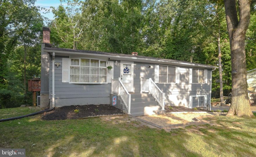 Welcome to your dream home nestled in the serene neighborhood of White Sands Lusby! This charming ramble-type house is now available with a spacious floor area of 2304 total square feet, this home offers ample space for you and your loved ones to create lifelong memories.

The kitchen boasts convenience an open layout, an inviting eat-in area, and updated appliances that will make cooking a breeze. The new flooring adds a touch of elegance to this culinary haven, and is perfect for entertaining.  And steps out onto a covered deck overlooking the wooded privacy in your backyard. And do not forget the two-car garage and plenty of parking, accommodating your guests will never be a hassle. Plus, a shed provides additional storage space for all your recreational equipment.

Located in the water-oriented community of White Sands, this home offers the perfect blend of comfort, convenience, and natural beauty. Enjoy nearby amenities such as parks, shops, and restaurants while relishing the peacefulness of this charming community.

Don't miss out on this incredible opportunity to make this ramble-type house your forever home. Contact us today to schedule a viewing and start living the life you've always dreamed of!