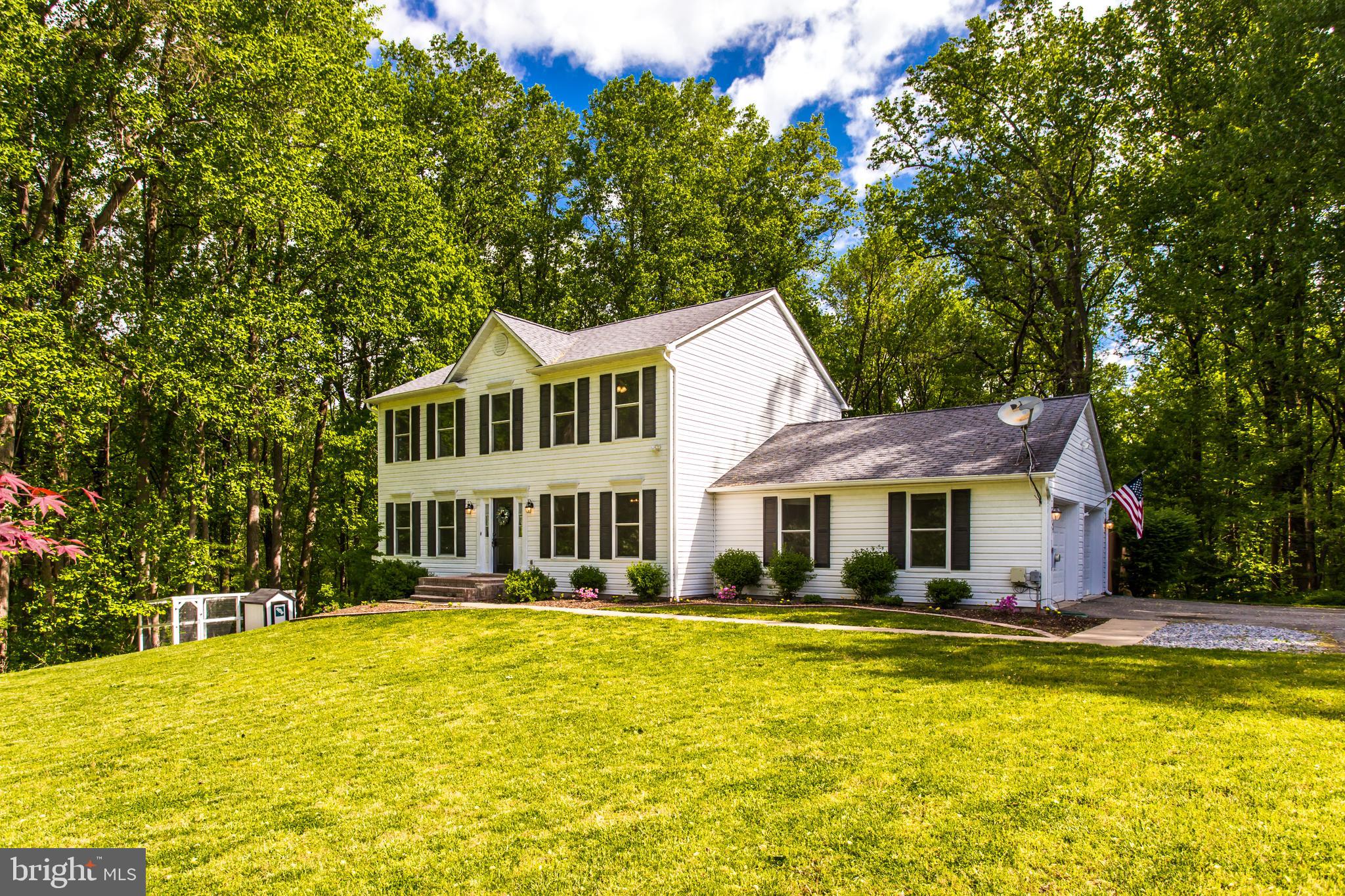 Peace & serenity on over 5 acres! 100% financing (RDA/USDA) eligible! This meticulously maintained home boasts over 2,000 square feet of finished living space. 4 Bedrooms, 2.5 Bathrooms & oversized 2 car side entry garage. Bright and airy kitchen with leathered granite, stainless appliances and new flooring. Large family room with crown molding, formal living room and formal dining room with chair rail. Oversized owner's bedroom suite offers a walk-in closet and full bathroom with dual vanity, oversized soaking tub, separate shower, water closet and linen closet. The open floor plan is perfect for entertaining and has a great flow. Laminate flooring throughout, fenced backyard, shed, chick coop (w/chickens and fresh eggs daily, if desired), new windows (2018), newer A/C (2015), air ducts cleaned (2019), additional freezer in garage, built-in shelves & more! Inviting neutral paint palette inside and out! Relax and entertain on the large deck overlooking the fenced backyard while enjoying serene views backing to protected land. The sprawling landscape with mature trees lends natural privacy and the opportunity to explore, roast marshmallows over the fire pit, camp & hike. Don't miss out on this amazing opportunity to make this beautiful house your home! Close to shopping, restaurants, library and University of Maryland Charles Regional Medical Center. Zoned for La Plata schools. Conveniently located to Joint Base Andrews, Pentagon, Bolling, MD-5, I-495 Beltway, Washington, DC, Virginia, commuter bus lots and Branch Avenue metro station. Must See! Virtual Tour: https://my.matterport.com/show/?m=EaqPd61SZu2&brand=0