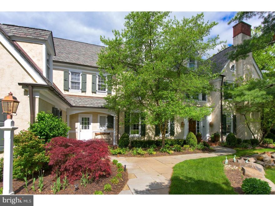 Charming 5 Bedroom, 4.3 Bath French country styled home in most desirable Harriton Farms, positioned on one of the largest lots with an end cul-de-sac location. Professionally and tastefully decorated with an eye towards easy and elegant living. Walk along the path across the well-manicured front lawn and open the front door to the large Foyer centered on a formal stair and highlighted by exquisite crown molding, 9  foot ceilings and opposing wide entrances to the formal areas of the home.  To the right find the elegant Formal Living Room naturally lit by 4 large windows and focused on a brick wood burning fireplace with stone and carved wood surround that extends from floor to ceiling.  This space extends to a private Study that can serve as an intimate gathering space or quiet escape.  The Formal Dining Room with a Butler's Pantry offers the space and amenities needed for both elegant dinner parties and impromptu entertaining.  The spacious chef's Kitchen provides a magnificent island workspace, granite countertops, stair to the second floor, pantry and top of the line appliances such as a Thermador 5 range gas stove, a Miele dishwasher and Sub- Zero Refrigerator.  The Kitchen opens to a bright Breakfast Room with cathedral ceilings and steps down into the vaulted ceiling Family Room complete with brick fireplace with carved wood mantle and adjacent built in cabinetry.  Ascend the grand stair and enter the Master Suite complete with a Dressing Room, His and Her walk-in closets, and a Master Bath with opposing His and Her vanities, sit-down shower, and massive soaking tub.  The Second Level is completed by 4 other bedrooms, two with en suite Baths and two connected by a large Bath with separate vanities on either end of the room, a Laundry Room, and a large hall workspace.  The finished Lower Level features wall to wall carpeting, a large room with a Screening Area with projector, a Billiards Area, and a Powder Room.  One truly finds the entertainment center in the backyard.  Walk out onto a carefully designed and beautifully landscaped oasis that makes this home the envy of Harriton Farms.  Find a spacious porch equipped with two ceiling fans, custom bar with sink, refrigerator, and wiring for mounted TV, and a lovely outdoor Dining Area.  This shaded suite overlooks a custom designed pool and hot tub surrounded by lounge chairs and thoughtfully placed plants and shrubbery.  This "at home" resort is ideal for entertaining large parties or dining al fresc
