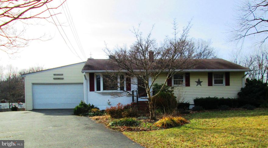 WOW!  This is not your typical Rose Hill Home.  A huge 2 car garage &  a 285' family room addition.  This 4 bedroom 3 bath home has beautiful hardwood floors,  fresh neutral paint, new flooring on the lower level, 2 zone HVAC, custom shelving, screened in porch, deck, patio, and a large fenced in rear yard.  All this and close to shops, restaurants, schools and lots of commuting options. Go & Show