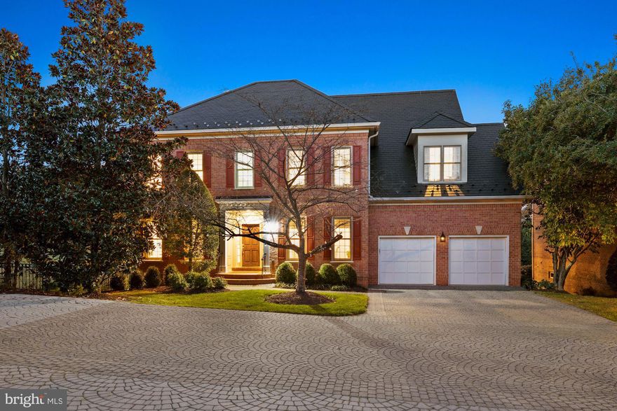 Panoramic views of the TPC at Avenel Golf Course abound from the sunny and high ceilinged interior of this
Prescott at Avenel Georgian residence in POTOMAC, MARYLAND.  One of the newer homes in Avenel, this three story home provides fabulous entertaining spaces including a huge outdoor deck perfect for family living and todays entertaining styles.. The open floorplan allows for a sunny exposure in every room in the house. This home provides a total of 6 bedrooms and 5 full and one half bath.  The main level offers a spacious living room overlooking the golf course, a generous dining room,  a large open family room with fireplace and a cooks dream kitchen with island and breakfast room.  The butlers pantry is conveniently located bewteen the kitchen and dining room.  Upstairs you will find a stair hall worthy of another seating area, four bedrooms and three full baths along with an upstairs laundry.  The owners suite includes one of the most well designed walk in closets  along with a separate vanity area. The daylight walkout lower level is flooded with light and provides additional entertaining space with a wet bar and fireplace, along with two additional bedrooms and two full baths.
A two car garage completes this home along with a cobblestone drive.   Views of the TPC golfcourse are panoramic as if looking out over 10 acres.  This one is special!