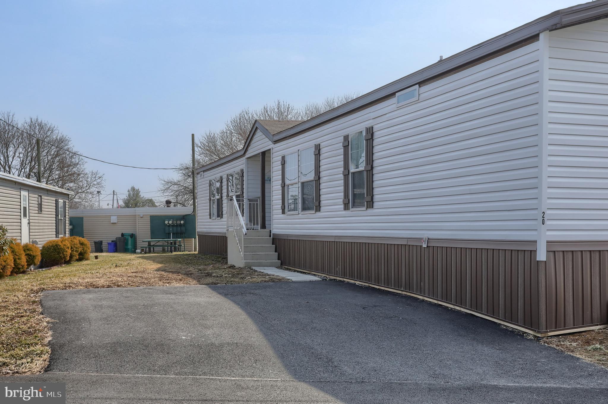 This beautiful, newer 3-bedroom, 2-bathroom mobile home offers comfort and modern living in a convenient location. The cozy living room is enhanced by an electric fireplace, perfect for relaxing during colder months. The fully equipped kitchen includes stainless steel appliances and plenty of cabinet space, making it a great space for cooking and entertaining. The spacious master suite features a private en-suite bathroom and a large walk-in closet, creating a peaceful retreat. Ideally situated close to schools, parks, and shopping, this property is perfect for families or anyone seeking a low-maintenance, move-in ready home. Schedule your private showing today.
