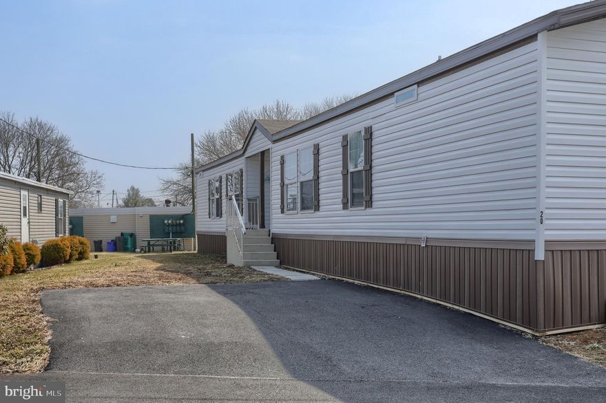 This beautiful, newer 3-bedroom, 2-bathroom mobile home offers comfort and modern living in a convenient location.  The cozy living room is enhanced by an electric fireplace, perfect for relaxing during colder months. The fully equipped kitchen includes stainless steel appliances and plenty of cabinet space, making it a great space for cooking and entertaining. The spacious master suite features a private en-suite bathroom and a large walk-in closet, creating a peaceful retreat.  Ideally situated close to schools, parks, and shopping, this property is perfect for families or anyone seeking a low-maintenance, move-in ready home. Schedule your private showing today.