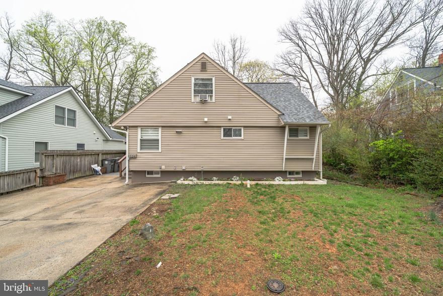 Discover this rare, sunlit Cape Cod home in the heart of Rockville, offering approximately 2,200 square feet of finished living space across three levels. The main level features an open floor plan with wood floors throughout, a cozy wood-burning fireplace, and direct access to the expanded deck, perfect for outdoor entertaining. The renovated kitchen and bathrooms add modern elegance to this charming home. 2 bedrooms and 1 full bath on the main and upper level with an added walk-in closet upstairs. The finished walkout basement provides additional living space, including a family room/office/gym/den, kitchenette and a full bathroom. It could also be used as an in-law suite. Recent updates include a roof and water heater, both about 3-4 years old, dishwasher and washer/dryer that are less than a year old and new fridge. A partially fenced yard featuring a spacious shed that backs to a wooded area. Access through back yard to neighborhood trail leading to Calvin park. Home located down the street from Calvin Park and bus stop #45. Easy access to Veirs Mill Rd, Route 355, and Norbeck Rd. It's less than two miles from both Rockville and Twinbrook Metro stations and within a five-minute drive to multiple shopping centers, parks, schools, and The Square (formerly Rockville Town Center). With no HOA fees and situated within the City of Rockville, this property presents an exceptional opportunity to own a beautifully updated home in a prime location. Main water pipe replaced last year. Seller rent back needed