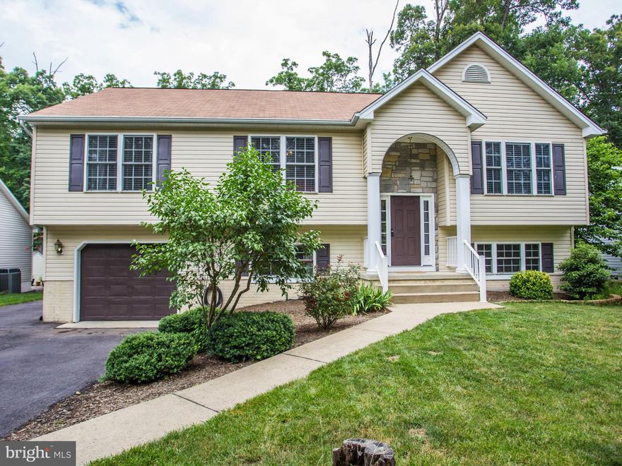 Stunning, nicely landscaped, & within walking distance to beach, marina, and park, this 2700 sq ft home offers gourmet kitchen & upgrades too numerous to list! Play a round golf, swim at the pool, take a dip in the lake or lounge on a sandy beach, trail ride from the equestrian center, or dine on the deck of the Clubhouse overlooking the pristine lake...all at amenity-rich Lake of the Woods, VA!