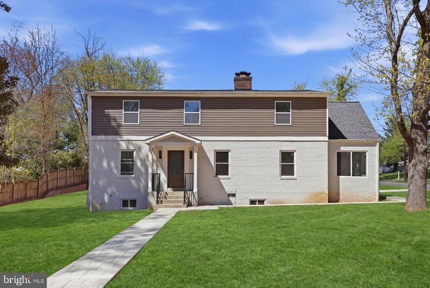 Welcome to 6420 Spring Terrace in Falls Church, Virginia, a spacious and thoughtfully designed home offering comfort, functionality, and beautifully appointed living spaces across three finished levels. The main level features a sunroom, an open-concept living room with a fireplace, and a dining area that flows seamlessly for both everyday living and entertaining. The gorgeous kitchen serves as the heart of the home, showcasing a waterfall island, white shaker cabinetry, and ample space for gathering and meal preparation. This level also includes a bedroom and a full bath, providing excellent flexibility for guests, multigenerational living, or a home office.

Upstairs, the primary suite serves as a private retreat with an en suite bath and a large custom walk-in closet. Three additional bedrooms and a full hallway bath complete the upper level, with all closets throughout the home featuring custom shelving for exceptional organization and storage.

The lower level offers a generous secondary living area ideal for a recreation room, media space, or casual lounge, along with an additional bedroom and full bath. A separate garage with parking for two cars adds even more convenience to this well-appointed home.

Ideally located in Falls Church, the home offers convenient access to major commuter routes, shopping, dining, and everyday amenities, making it easy to enjoy both a quiet residential setting and the convenience of nearby urban hubs.