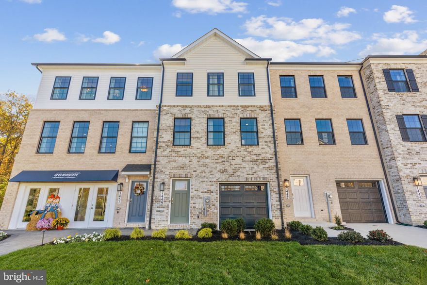 New Home in the PERFECT LOCATION! Backing to trees, this townhome features 3 bedrooms, 3.5 baths, a lower level den (that can double as a 4th bedroom) and INCLUDES a 12' x 10' DECK off of the kitchen. Thoughtful design is uniquely embodied in this townhome plan, which features 1,969 sq ft of living space. This home offers a spacious rear main level eat-in kitchen with upgraded white cabinets, quartz countertops and stainless-steel Whirlpool appliances. Recessed lighting and blinds are provided throughout the home as well.  Hard surface flooring throughout the entire home offer modern luxury and contemporary appeal. The third level features a luxurious primary suite with a large walk-in closet and a spacious double vanity primary bathroom.  Two secondary bedrooms, upper level laundry, and hall bathroom which also includes upgraded white cabinets and a quartz countertop. There is plenty of space for entertaining family and friends in your finished lower level den leading to your private backyard. Simplify your life with D.R. Horton's smart home technology which includes a keyless entry, Skybell (video doorbell), programmable thermostat to adjust your temperature from your smartphone and much more! Commuting and traveling are made easy with quick access to Routes 301, 5, I-495 and the Washington DC area.