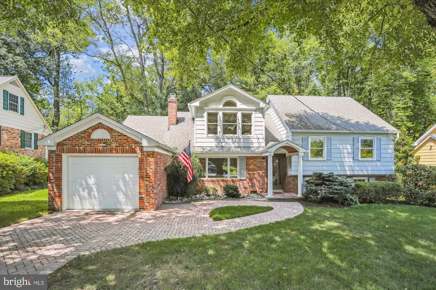 *BEAUTIFUL* 5BR/2.5 BA home nestled on a quiet street in the sought-after Foxhall neighborhood of McLean! This wonderful home features multiple additions and renovations over the years; sparkling hardwood floors; large and inviting living room with fireplace, picture window and crown molding; separate, formal dining room with chair rail and butler’s pantry.  The spacious kitchen includes cooktop, double oven, stainless steel appliances, ample cabinet space and large breakfast room with French doors to a private rear deck - perfect for dining al fresco!  Completing this level is an expansive family room with vaulted ceiling and exposed wood beams, plus a gas fireplace and a large picture window overlooking the treed backyard.  Upstairs, relax in the primary en suite with sitting area, vaulted ceiling, two large walk-in closets and access to a walk-up attic with a large cedar closet and tons of storage. The primary bathroom features a soaking tub, separate shower and skylights.  There are 3 additional spacious bedrooms and a full-size bathroom on the third level. The lower level features an additional bedroom or office with built-ins and a large storage closet and laundry room with cabinets, plus walk-out to the private back patio area.  There is an additional back entrance behind the home with a temperature controlled wine cellar and storage area. This gorgeous lot backs to Pimmit Run offering privacy and views of the parkland.  Boasting over 4100 sq ft with 4 levels of expanded living space! The entire home was professionally painted (August 2024).  Conveniently located 5 minutes to West Falls Church Metro. Less than a 10 minute drive to Tysons, Arlington, Falls Church City, and approximately 20 minutes to DC.  Kent Gardens ES, Longfellow MS, and McLean HS!