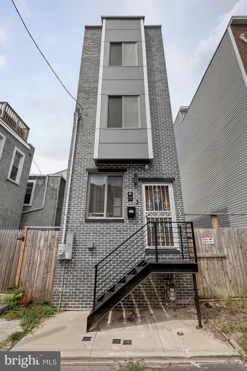 This newly constructed 4-bedroom, 3-bathroom townhome at 2542 Arcadia St delivers modern luxury in the heart of vibrant Fishtown. The open floor plan showcases a gourmet kitchen with 42-inch cabinetry, quartz countertops, and premium stainless steel appliances, while high-end finishes and abundant natural light create an inviting atmosphere throughout. Outdoor living features an enclosed back patio perfect for grilling and a private rooftop deck offering stunning Philadelphia skyline views. Located steps from Fishtown's best shopping, dining, and entertainment, with convenient access to I-95 and major highways for easy commuting. 8-YEAR TAX ABATEMENT LEFT! This exceptional property combines contemporary design, quality craftsmanship, and an unbeatable location for the ultimate urban living experience. Schedule your tour today to see this remarkable home.