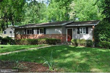 Updated rambler near park with gorgeous updated kitchen, Hardwood floors, fireplace and no through street location. Steps to shopping and Capital Crescent Trail. Freshly painted with new carpet. Full finishedwalk out basement. Close to community pool and shopping.