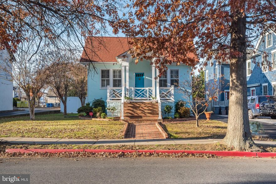 This lovely light blue stucco home has curb appeal and interior charm.  Located in the heart of the Eastport Peninsula, this home was originally built in 1928 and through the years has been enhanced and improved.   Open floorplan on the main level with living room, dining room and kitchen with eat-in bar.  Custom built kitchen cabinets.  Viking double wall ovens.  Gorgeous tile backsplash and under cabinet lighting in the kitchen.   Beautifully  maintained hardwood floors.  Custom plantation shutters that let light flow through out the main level.    High airy ceilings.  Primary bedroom and bedroom/office on the main level.     Spacious family room on the lower level and separate office that can be used as an extra guest bedroom  - with tiled floors and built-ins.   Extra bedrooms or other living space could  be added to the upper level attic space.   The backyard is very large with tall fencing for privacy.   Room  for a bump-out from the house,  potential for outdoor kitchen with fire pit; gardener's delight - flowers and vegetables; patio; workshop, etc.  Large area for children's playground and also  good for dogs to have their space.  Perfect location in Eastport to take advantage of proximity to  downtown Annapolis, Naval Academy, Annapolis Maritime Museum, yacht clubs, marinas, local restaurants and pubs.  A great lifestyle awaits in this delightful home!