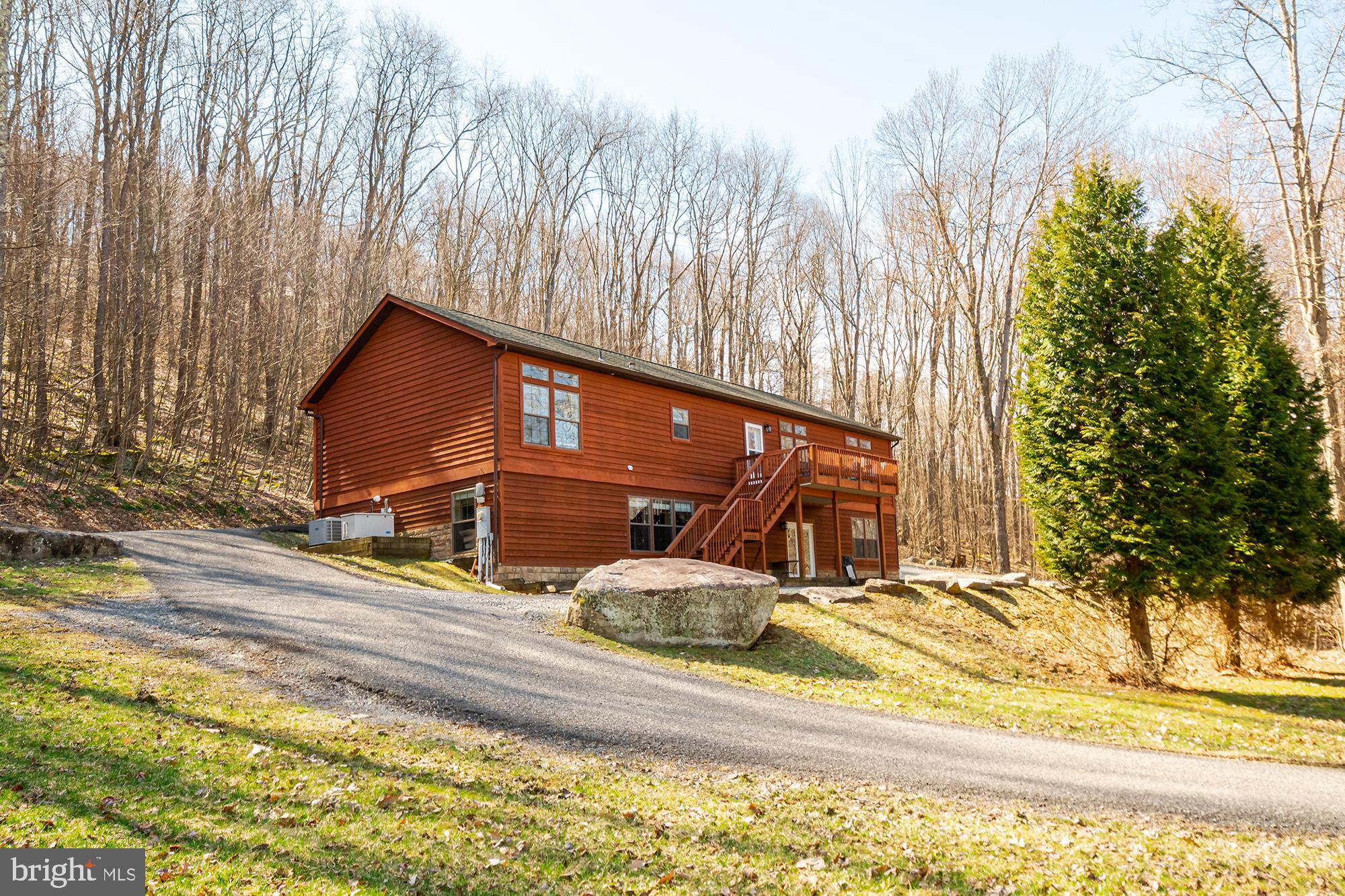 Don’t miss your chance to own this stunning mountain retreat—just minutes from Deep Creek Lake!
Welcome to Hillside Hideaway, a spacious 5-bedroom, 3-bathroom home offering over 3,500 square feet of beautifully maintained living space. Two of the bathrooms have been completely remodeled, and the home features two cozy gas fireplaces and breathtaking views of the surrounding mountains.
The chef’s kitchen is a standout with a gas range, double ovens, an island, and stainless steel appliances—perfect for entertaining. Downstairs, enjoy a large family room complete with a pool table, wet bar, two bedrooms, and a full bath.
Step outside to unwind in the hot tub, gather around the fire pit, and soak in the serene mountain atmosphere.
This home is also a proven rental success with strong reviews—ideal as an investment property or private getaway. Located just minutes from Deep Creek Lake, Wisp Ski Resort, Swallow Falls, Herrington Manor, golf courses, restaurants, and more.
Call today to schedule your private tour!