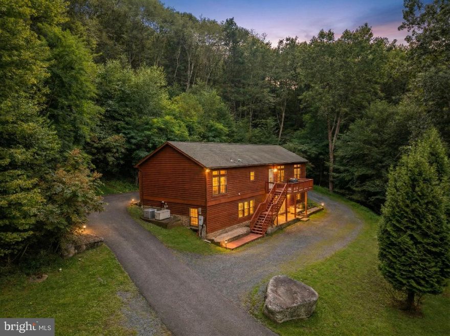 Don’t miss your chance to own this stunning mountain retreat—just minutes from Deep Creek Lake!

Welcome to Hillside Hideaway, a spacious 5-bedroom, 3-bathroom home offering over 3,500 square feet of beautifully maintained living space. Two of the bathrooms have been completely remodeled, and the home features two cozy gas fireplaces and breathtaking views of the surrounding mountains.

Please note:  There is a BRAND NEW roof that was just put on this past fall.   Also a new HVAC Damper that has a dual zone was installed.


The chef’s kitchen is a standout with a gas range, double ovens, an island, and stainless steel appliances—perfect for entertaining. Downstairs, enjoy a large family room complete with a pool table, wet bar, two bedrooms, and a full bath.

Click "Virtual Tour" to see a video!

Step outside to unwind in the hot tub, gather around the fire pit, and soak in the serene mountain atmosphere.

This home is also a proven rental success with strong reviews—ideal as an investment property or private getaway. Located just minutes from Deep Creek Lake, Wisp Ski Resort, Swallow Falls, Herrington Manor, golf courses, restaurants, and more.

Call today to schedule your private tour!