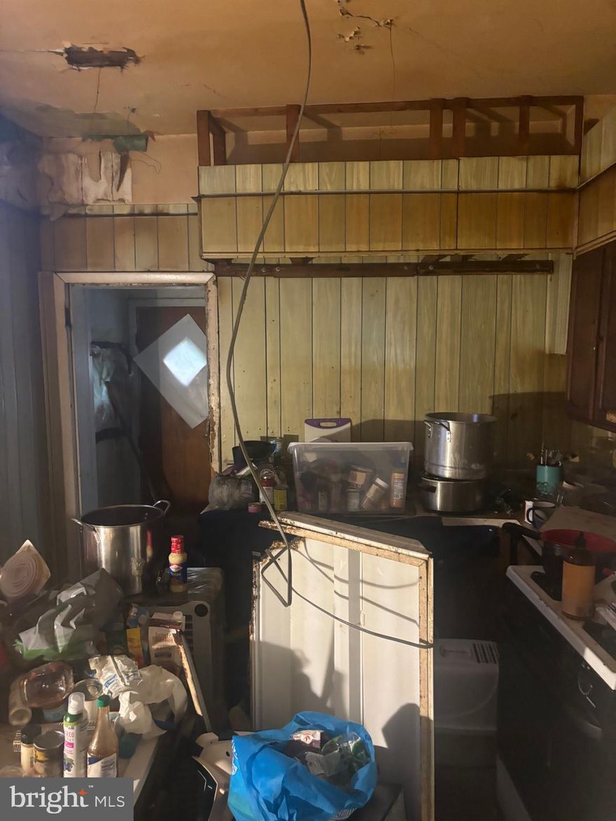 Welcome to a great opportunity . This is a must add to your investment portfolio or  a great owner occupant rehab loan project. priced to sell. look at other properties that have sold on the block.  this is a complete rehab.