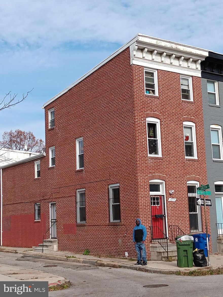 Rarely avaiable  a potential real estate investment opportunity with a 2-unit apartment building near the University of Maryland Hospital, Hollins Market, and Lexington Market.  Each apartment has 2 bedrooms and 1 bath

Location:

Proximity to the University of Maryland Hospital can be a significant advantage, as it may attract potential tenants, especially students, faculty, or healthcare professionals.
Consider the neighborhood's overall safety, amenities, and future development plans.

Property Features:

The fact that each tenant pays their own gas and electric bills is a positive aspect as it can reduce the landlord's utility expenses.
The property, including a fire escapes and the fenced backyard. Ensure the property complies with safety regulations.        Being sold as is