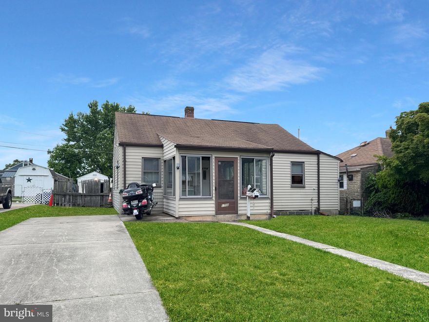 Get ready to fall in love with this adorable Dundalk gem! This 2-bedroom, 1-bathroom bungalow is packed with personality and charm. Whether you're a first-time buyer, looking to downsize, an investor, or just want your own cozy spot near it all—this is the one. Step inside and be greeted by warm natural light, a smart and open layout, and just the right amount of space to live, relax, and entertain without getting lost in the square footage. The kitchen? Bright, functional, and ready for your signature dishes (or your go-to DoorDash order—we don't judge). The living area flows beautifully for everyday living or hosting your favorite people. Out back, you've got a nice-sized yard—perfect for pets, play, gardening, or that backyard BBQ you've been dreaming about. Walk-up stairs to the attic space provides plenty of room for storage and possible third bedroom. Newly installed this year are the water heater and toilet. Flat driveway can accomdate up to three vehicles. Bonus: the quiet street and friendly neighborhood vibe make this home feel like a real community. Conveniently located near parks, shopping, schools, and just a hop from the water. Affordable. Adorable. Available. But not for long—schedule your showing today and see why this one feels just right!