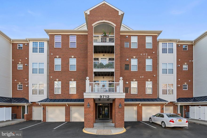 Leave your worries behind in this stunning and impeccably maintained corner luxury condo that is the gem of the sought-after community that is The Reserve!  First floor unit for convenience of entry, but rear of unit sits on the second floor for added views and security.  Newer HVAC(2022) and Newer water heater(2023) for worry-less living.  The bright and open interior features a sprawling near 1500 square feet of single level living space, stylish reclaimed wood feature walls, upgraded carpet and pad, wood like laminate floors installed over ceramic tiles providing options, in-unit laundry room with utility sink, 9ft ceilings, plenty of sun-filled windows and a neutral color palette throughout ready for your personal touches. The spacious eat-in kitchen offers Corian counters, plenty of cabinets/counter space and flows effortlessly to a flex/dining area to one side and to the other, a large entertaining space ready for game night gatherings or a quiet night in. The well-appointed primary suite has two closets and a large en suite bathroom with a corner soaking tub, stand up shower and dual vanities. Secondary bedroom and bath complete the interior of the unit.  Private balcony ready for countless afternoons relaxing or entertaining family and friends. Engaging community with pool and paved path to VRE, all conveniently located just minutes to Manassas Yards’ restaurants and shops, Blooms Park and easy access to major commuting routes.  Don’t Miss Out!!