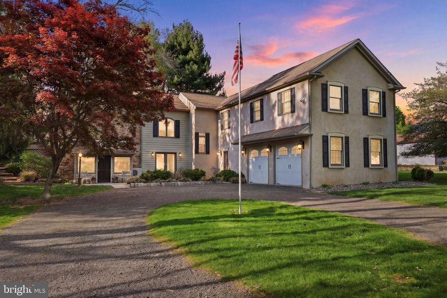 Notice the magnificent, mature 250 + year old Ash tree as it creates a natural canopy over this custom-converted 1750 Barn, unforgettable welcome to this one-of-a-kind home. Step into  this stunning residence  offering  a blend of historic character and modern comfort, set within a beautifully landscaped and private setting, backing to horse farm and often see deer visiting.  The moment you enter, the dramatic foyer offers  a soaring  ceiling, as you’re welcomed by the warmth of rugged wood surroundings and timeless craftsmanship that tell a story centuries in the making.  The dramatic foyer captivates you with original 1750 floor to ceiling stone walls  three-stories high—an unforgettable introduction to a home rich in character and architectural significance. Throughout the home,  wood elements, exposed beams, and upgraded wood flooring create a warm, timeless aesthetic. The heart of the home is the chef’s upgraded kitchen which includes 6 burner gas stove, pot filler, 42 inch cabinets with granite and was thoughtfully remodeled in 2018, designed for both everyday living and entertaining.

From the kitchen enter the dining room with butler pantry offering function and sophistication! The dining room offers glass French doors that open to the expansive bluestone patio, surrounded by professionally designed landscape surrounded by flowering plants and shrubs with ambient lighting.  

Above the kitchen offers an open and airy unique living area with stone walls, lighting,  sliding door to side deck,   wood burning fireplace with stone surround, all while overlooking the dramatic foyer and kitchen below .

A thoughtfully designed two-story addition, built in the early 2000s with quality 2x6 construction, enhances the home with modern comfort while preserving the historic charm.  Andersen windows with deep windowsills, 3 zone heating with central air, 2 1/2 car garage with openers, first floor laundry room, extensive upgraded lighting—including a seasonal “Christmas Package”, 200 amp electric, all add to the home’s thoughtful details. 

The family room is equally impressive, featuring  9 foot ceilings,  wall of windows/French door that fills the space with natural light, complemented by recessed lighting and  gas fireplace framed by elegant casement windows with distinctive transom tops and a second stairway to the upper floor.  The French doors lead to expansive two level  bluestone patios, surrounded by professionally designed  stone walls and landscaping with flowering perennials and ambient lighting—creating private  indoor and outdoor living blend beautifully.  A wonderful gathering place for family and friends rain or shine. 

Retreat to the expansive primary suite through grand double doors, where tray ceiling, recessed lighting, dual closets, and luxurious en-suite bath await. The spa-like bath features a jetted soaking tub, walk-in shower, and double vanity—your own private sanctuary. 

 Additional living spaces include a vaulted second bedroom with two closets and  window seat, third-floor loft/ bedroom with generous storage and an expansive airy game room with vaulted ceilings, (could easily be renovated into  2 bedrooms with Jack & Jill full bath), provides the perfect space for recreation, hobbies or entertaining guests .

With upgraded finishes throughout and a seamless blend of old-world craftsmanship and modern updates, this one-of-a-kind home offers a lifestyle unlike any other—a rare opportunity to own a piece of history, reimagined for today’s living. An excellent opportunity for the discerning buyer seeking character, privacy, and timeless design.  Council Rock Schools!  Reasonable taxes.