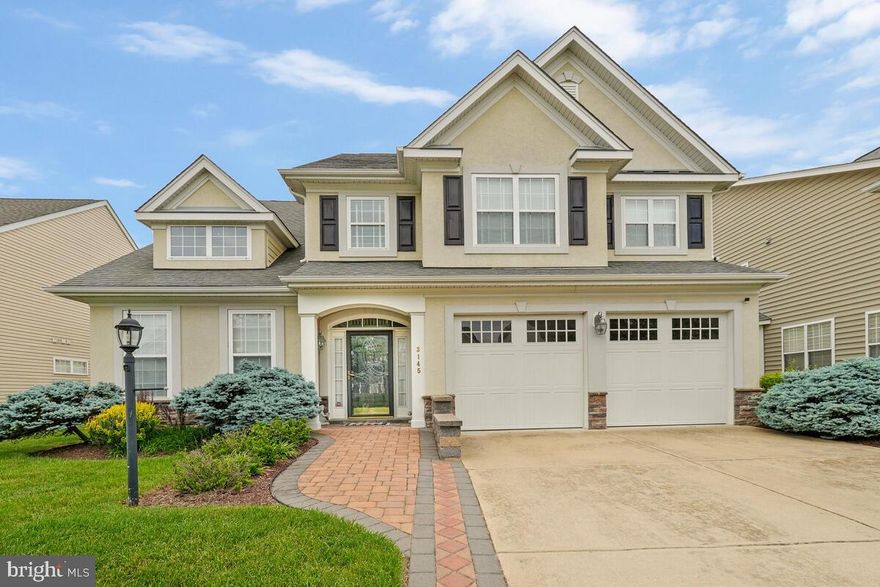 PRICE IMPROVEMENT! DISREGARD days on the market. Seller has found home of choice.  55+ community.  Only ONE is required to be 55+. Adults 21 years or older can reside with homeowner that is 55+ older.  Multigenerational Living! No need to wait  for new when you can have like-new perfection—move-in ready today? This expansive and elegantly Colonial is nestled in a sought-after active adult community offering resort-style amenities including a clubhouse and pool. From the moment you enter, you’ll notice the gleaming hardwood floors throughout the main level, a spacious hardwood foyer, and natural sunlight flooding the home. Elegant touches are present throughout, including crown molding, built-in cabinetry in the owner’s suite and loft, and a two-sided fireplace in the family room.
The main level features two bedrooms, including a generously sized owner’s suite with a sitting area, ceiling fan, and luxurious en-suite bath. The second bedroom is conveniently located and shares a  full bath—ideal for guests or a home office. The gourmet kitchen offers ceramic tile flooring, under-cabinet lighting, a breakfast bar, built-in wall oven, microwave, and flows into a sunlit breakfast area with sliding glass doors leading to a private, fenced patio—perfect for morning coffee. Additional living areas include a formal dining room, family room, morning room, and sunroom.
Upstairs, you'll find a large open loft with built-in cabinets, three additional bedrooms, ceiling fans, and a full bath—ideal for entertaining, hobbies, or extended guest space. The home also features main-level laundry, a two-car garage, and ample parking.

Although located in 55+ community, only ONE is required to be 55+. Adults 21 years or older can reside with homeowner that is 55+.

Conveniently located near major commuter routes, shopping centers, restaurants, and just a short drive to several military installations including Joint Base Andrews, Joint Base Anacostia-Bolling, and Indian Head Naval Support Facility. This home has been immaculately maintained and offers unmatched space, comfort, and value for 55+ multigenerational living.