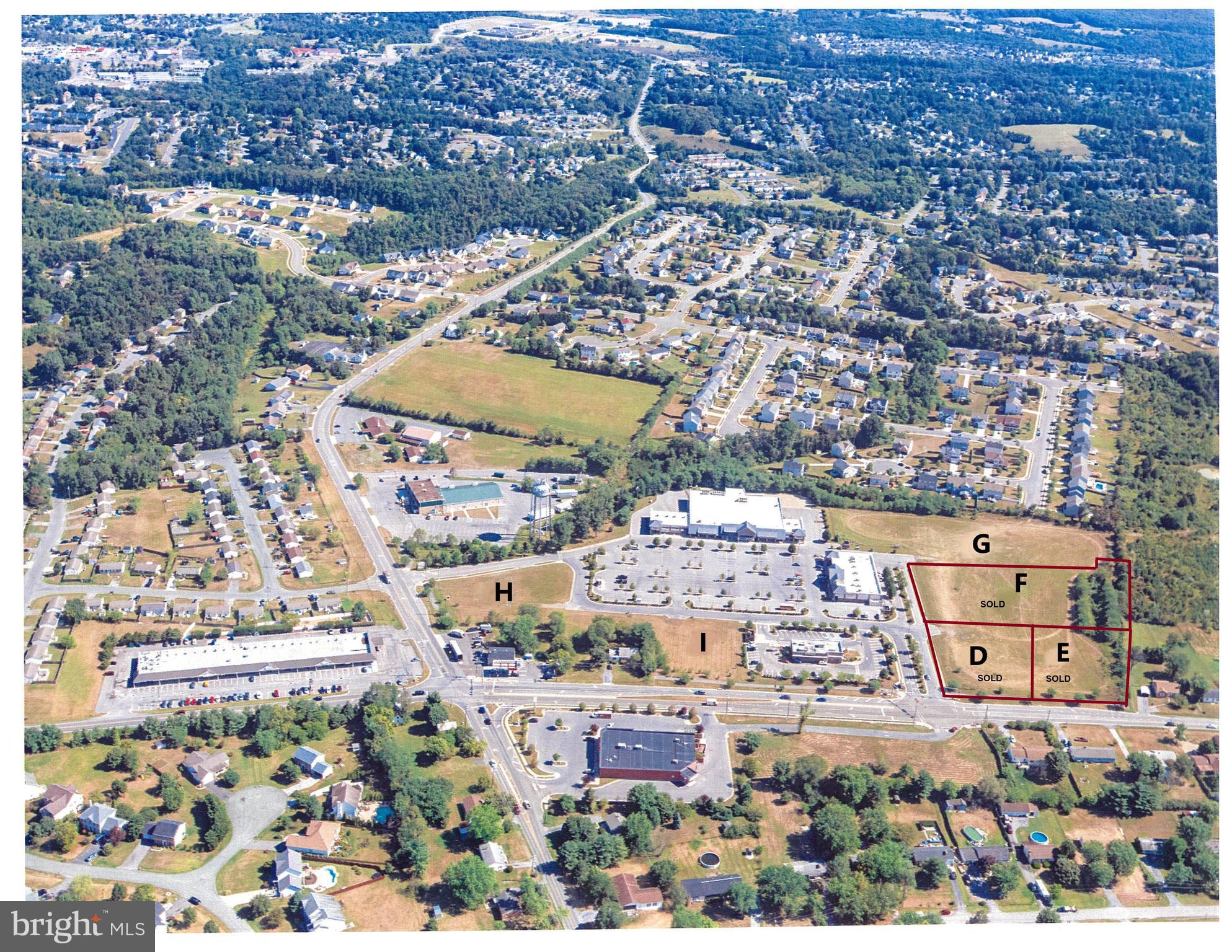 PRICE REDUCED!! Owners are looking for reasonable offers. Lot fronts on Senseny road but can be accessed from the shopping center parking lot. Also can be purchased jointly with Lot H. Lot is flat and ready for development. The house adjoining the lot may also be available for purchase.