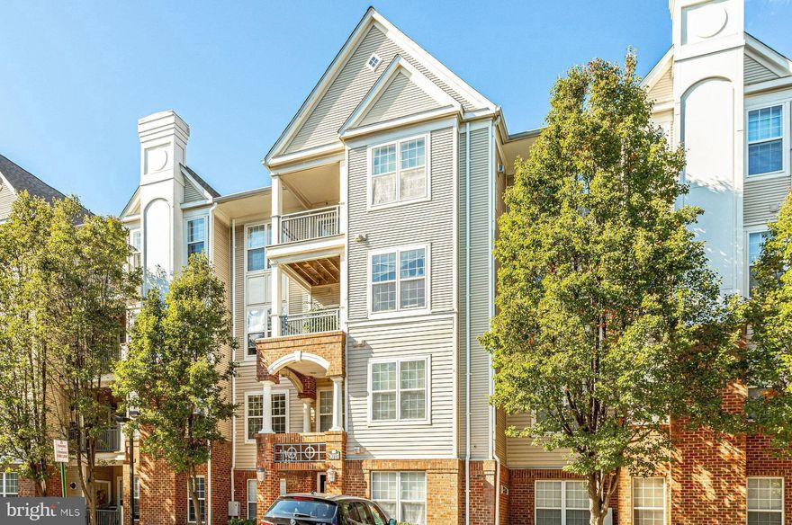 Welcome home to High Pointe at Jefferson! You’ll love this 2 bedroom condo’s open floor plan and convenient location! Newer luxury vinyl plank flooring (2022) and elegant crown molding greet you at the front door and lead you into the beautifully updated kitchen (2023), which features modern two-tone cabinets, stainless steel appliances, quartz countertops, and a filtered water faucet. It opens directly into the dining area and living room, making the space ideal for entertaining friends and family. In the cozy living room you’ll find a gas fireplace and large windows filling the unit with natural lighting. The primary bedroom includes multiple closets with custom shelving. The sophisticated en suite bathroom (updated 2022) boasts a luxurious walk-in shower and plenty of cabinet storage. On the other side of the unit, the second sizable bedroom features a large closet and wide window. The second full bathroom includes additional storage and access from both the second bedroom and the living area. In-unit laundry is conveniently located to make your life easier. A private balcony off the living room could be the perfect place to enjoy your morning coffee or unwind after a long week. HVAC units were replaced in 2023, giving you one less thing to worry about. Two assigned parking spaces are included (one in the secured garage and one in the above-ground lot). Amenities in this community are plentiful! Enjoy access to an outdoor pool, clubhouse, fitness center, playground, and green space. Minutes to Harris Teeter, Lidl, Aldi, Mom’s Organic Market, Target, Sweetwater Tavern, bartaco, True Food Kitchen, Mosaic Shopping District, Angelika Film Center, Gatehouse Plaza, Providence Community Center, Jefferson District Park and Golf Course, Pine Ridge Park, and INOVA Fairfax. This location makes commuting a breeze, with quick access to Dunn Loring-Merrifield and Vienna Metro Stations, Lee Highway, Arlington Boulevard, Gallows Road, Route 7, Route 66, and I-495. Schedule a private tour of your new home today!