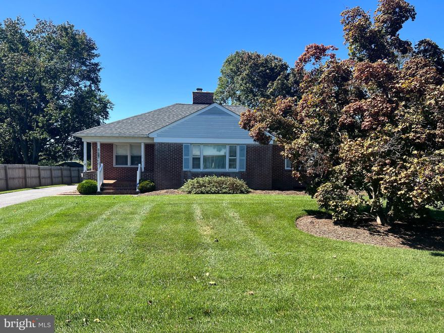 2 bed 2 bath rancher with beautiful yard.