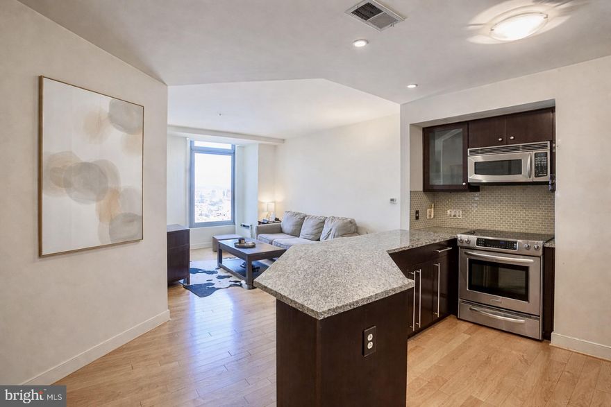 Experience elevated city living at The VUE in the heart of Harbor East. This  one-bedroom, one-bath condo features Large windows for natural lighting and views, new hardwood floors and updated carpet, a modern kitchen with granite countertops and stainless steel appliances. The bathroom offers a spacious walk-in shower. Enjoy the convenience of in-unit laundry with new washer and dryer. 1 signed parking + guest parking. 
Enjoy full-service luxury with 24-hour security, concierge Monday-Saturday, secure package delivery, and one deeded covered parking space. Residents have access to premium amenities including a dog park, EV charging, bike storage, and direct access to Harbor East Cinemas and the Coppermine gym (membership required).
Step outside to Baltimore’s most vibrant neighborhood—just moments from top dining, boutiques, Whole Foods, Starbucks, the waterfront promenade, and Water Taxi. With easy access to downtown, stadiums, Johns Hopkins, Penn Station, and BWI, this is ideal city living with convenience.