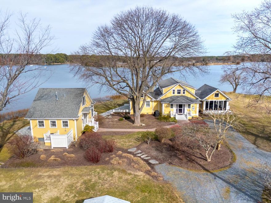 Shown by appointment only.  Do not drive in without appointment. Unique offering in the popular Village of Neavitt.  2 BR main house and 1 BR guest house on a private point of land offering sunrise and sunset views. With floor to ceiling windows throughout, the pristine waterfront seamlessly blends with the charming interior of both homes,  Every room has been designed to take full advantage of the water views.  Rooms in the main house include a bright and sunny living/dining room w/gas fireplace surrounded by built-in book/display cases, a great room w/ gas fireplace, main level BR and full BA and upper level master suite with walk-in closet/dressing room.  2 gas fireplaces, a custom designed screened porch (completed summer 2022). The welcoming guest house also offers panoramic water views from the great room to the upper level loft bedroom.  Private pier w/ approx. 3-4 ft. MLW (to be verified by buyer), floating dock. Appears to be room for pool (to be confirmed by Talbot Co.).