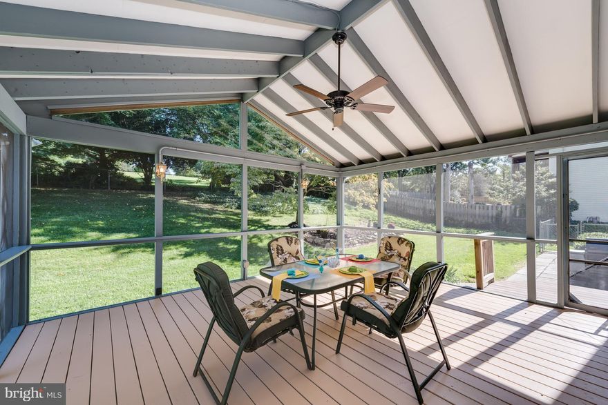 Beautiful 4BR Colonial with 2 car garage in desirable Spring Garden Estates. Gleaming hardwoods, brand new carpet/other upgrades. Kitchen with corian counters and cherry cabinets opens to large screened porch with vaulted ceiling perfect for entertaining and that summer barbeque. Nice backyard backs to parkland for extra privacy. Bonus of solar panels. New price, won't last.