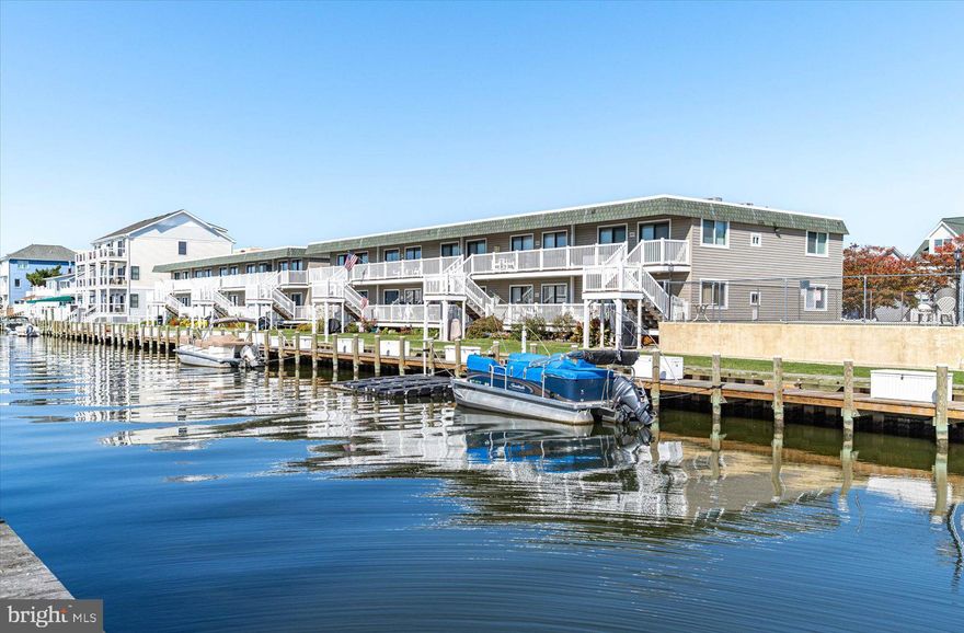This 2 bed, 2 bath water front condominium is located in the sought after 94th Street bay side area.  Located on a wide canal just east of the open bay, this unit provides great access and views of the water.  The Bridge Point II offers a community pool just steps from the unit and dock slips can be rented from the association. This property is offered furnished with just a few exclusions. A new HVAC compressor and air handler was recently installed.  All located within blocks of Liquid Assets, Bull on the Beach, Kirbys, Lombardi's, ACME, and Blue Fish Sushi Bar. This is the best in at the beach living. Welcome to the beach!!!