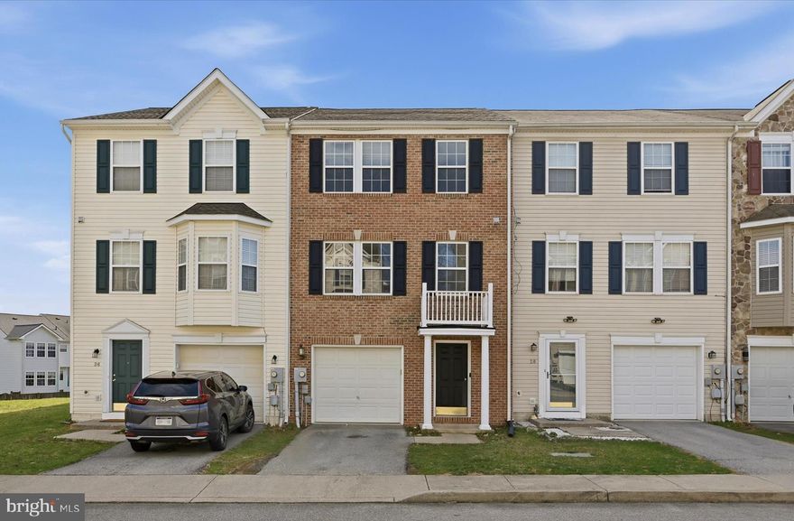 Fresh paint, a comfortable three-level layout, and a fenced rear yard make this Green Meadows townhome feel easy to settle into. The walk-in main level includes a welcoming foyer, laundry room, access to the backyard, and interior entry from the attached 1-car garage for everyday convenience. Upstairs, the main living level is designed for gathering, with a spacious living room, half bath, and an eat-in kitchen with breakfast nook that creates a natural space for meals, conversation, and daily routines. The upper level features a primary suite with attached ensuite bath, along with two additional nicely sized bedrooms and a full hall bath. Outside, the fenced rear yard offers a usable extension of the home with space to unwind, garden, or enjoy the outdoors. Green Meadows also offers a community tot lot and playground, adding to the neighborhood’s appeal.