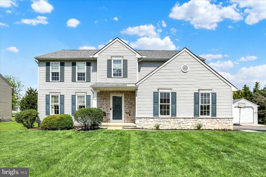 This elegant two-story residence is situated on nearly half an acre within the Somerset Crossing neighborhood of the Donegal School District. The property offers numerous features, including a recently renovated modern kitchen with quartz countertops, white subway tile backsplash, a center island, and stainless-steel appliances. The first floor is enhanced by attractive LVP flooring, a formal dining room with a tray ceiling, a family room filled with natural light, and a living room with accent wall and gas fireplace overlooking the rear yard. Last, a sliding glass door leading to the stamped concrete patio in the backyard.
Upstairs, there is a spacious foyer, featuring a bay window with a view, providing access to three bedrooms and a second-floor laundry area. The owner's suite is expansive, offering a walk-in closet and a full bathroom equipped with a soaking tub and a separate stand-up shower. The basement is divided into two rooms: a partially finished space that extends the home's living area and a utility room suitable for storage.
Outside offers a fully fenced rear yard with swing set, which will convey with the property, and a shed for extra storage. Last but not least, a paved driveway leading to the 2 car side entry garage!